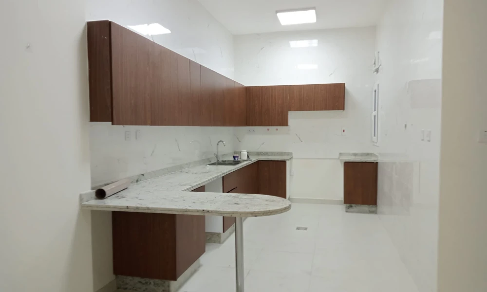 SPACIOUS 3BR APARTMENT IN AL WAAB | PARKING AREA - Image 7